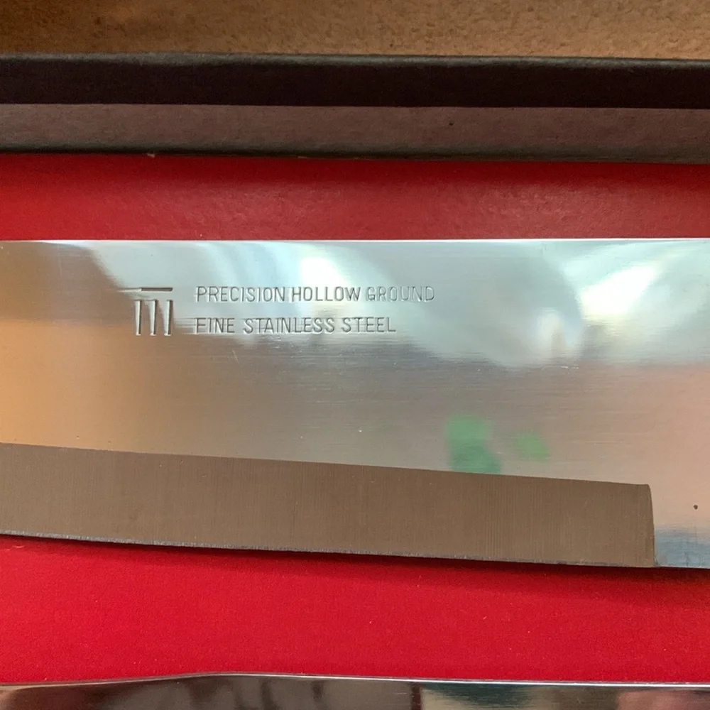 Set of Maxam carving knives in original box, blades approximately 6” & 8”